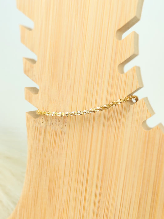 Cavigliera in acciaio attorcigliata