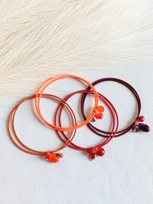 Bracciale elastico in acciaio arancio bruciato