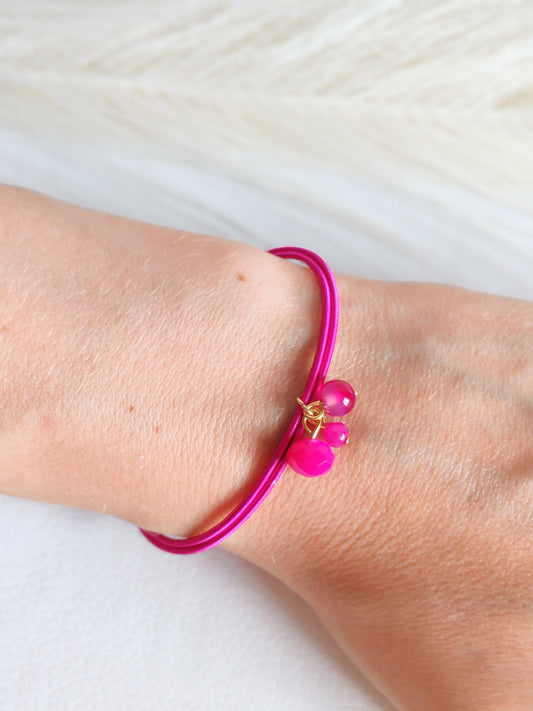 Bracciale elastico in acciaio fucsia