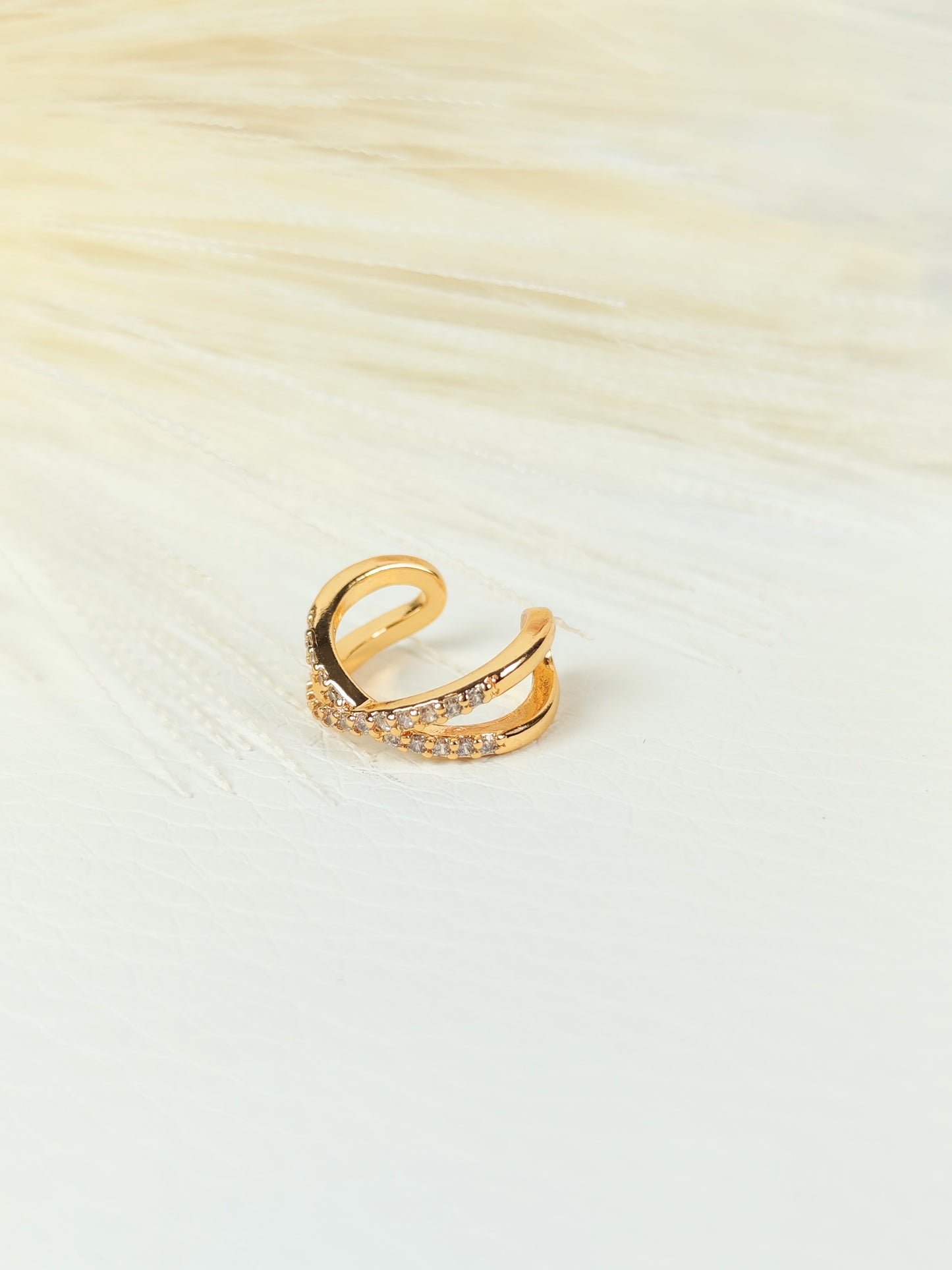 Ear Cuff acciaio dorato incrociato