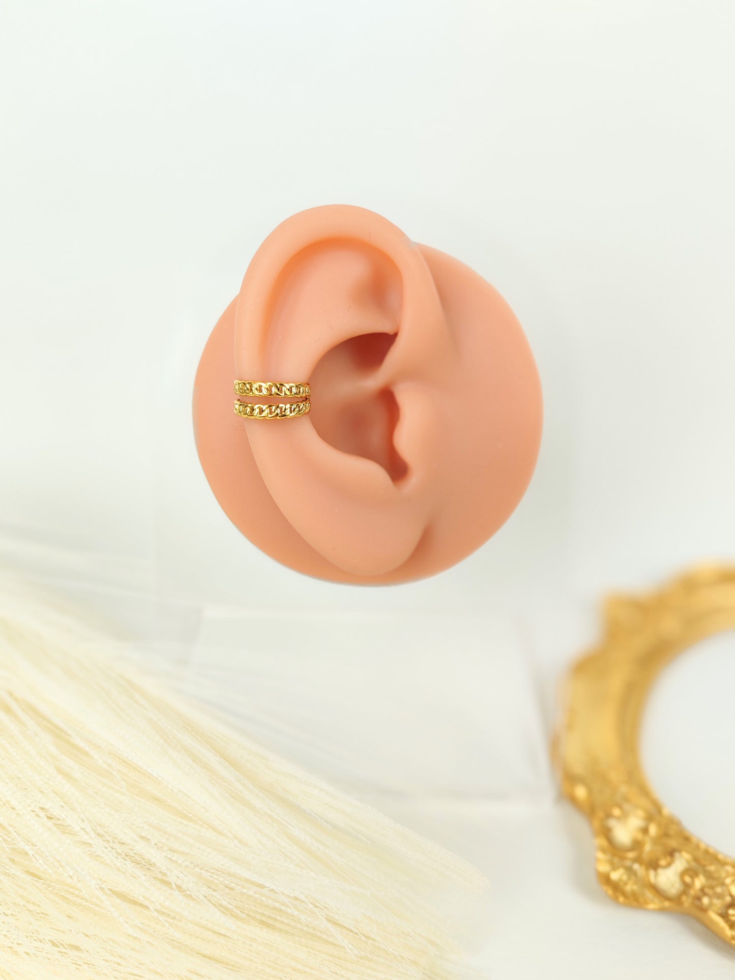 Ear Cuff acciaio dorato incrociato doppia catenina