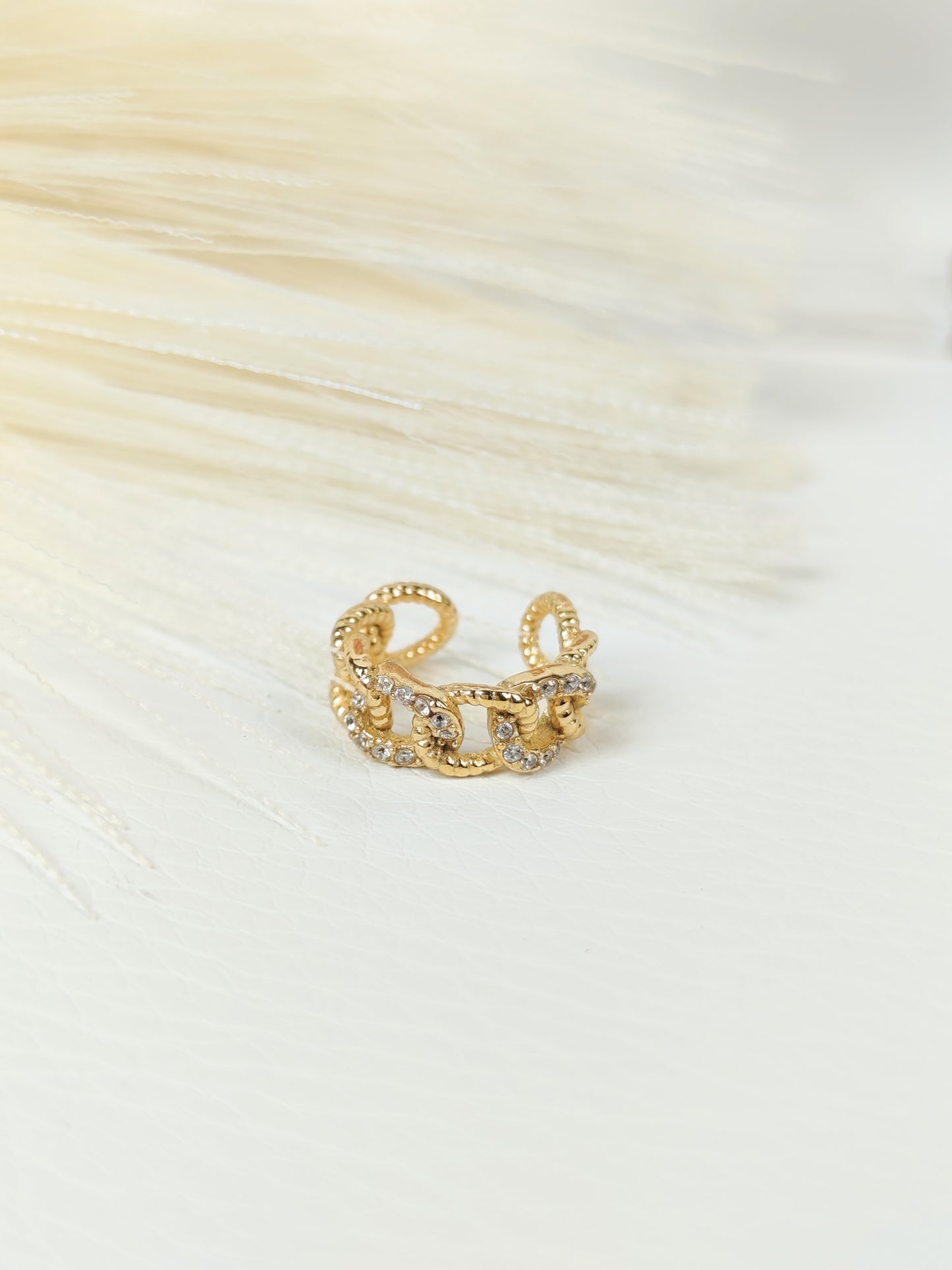 Ear Cuff acciaio dorato incrociato catena zirconi