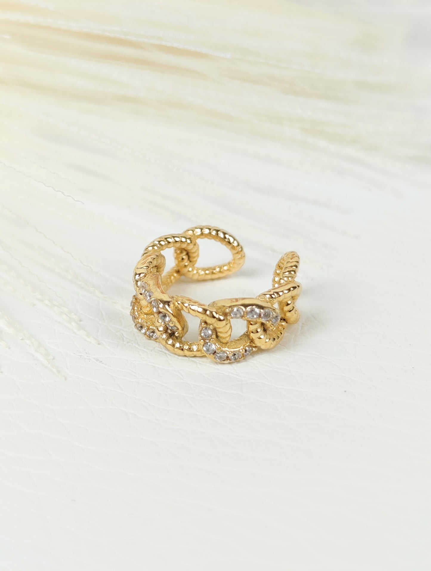 Ear Cuff acciaio dorato incrociato catena zirconi