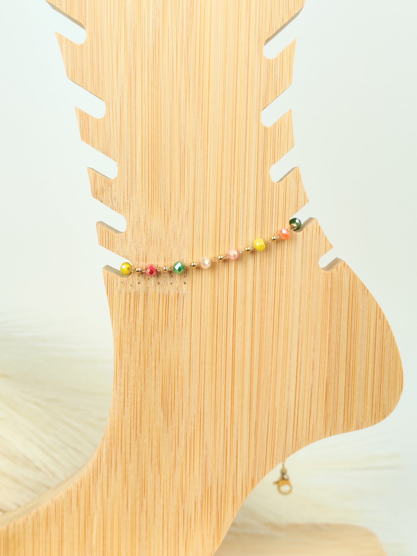 Cavigliera in acciaio con cristalli colorati