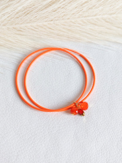 Bracciale elastico in acciaio arancio fluo