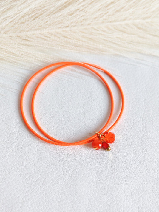 Bracciale elastico in acciaio arancio fluo