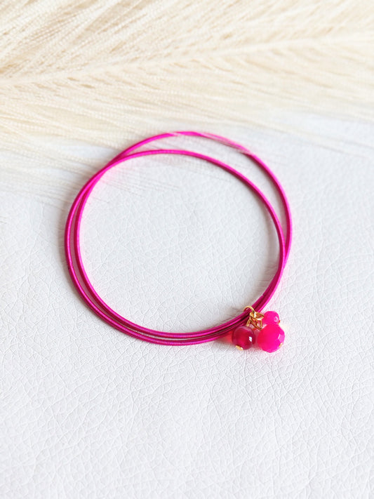 Bracciale elastico in acciaio fucsia