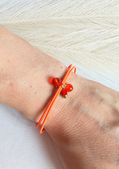 Bracciale elastico in acciaio arancio fluo
