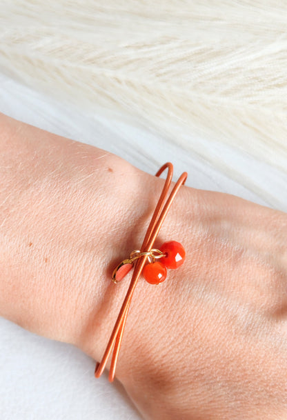 Bracciale elastico in acciaio arancio bruciato