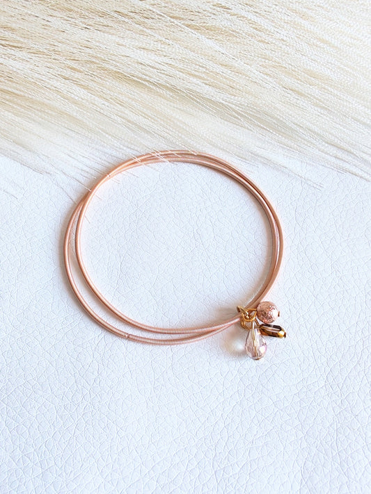 Bracciale elastico in acciaio rosato