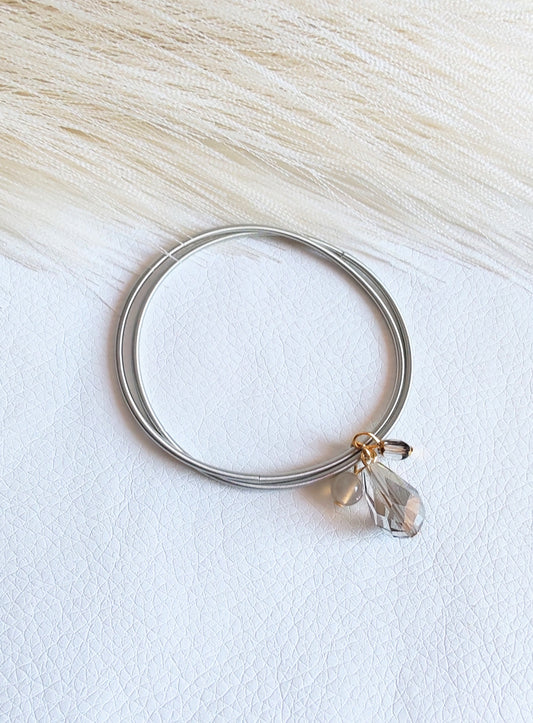 Bracciale elastico in acciaio grigio chiaro