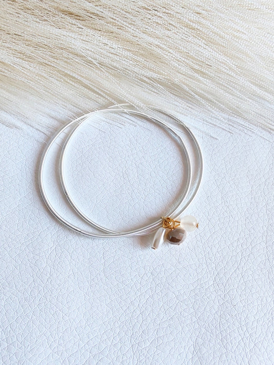 Bracciale elastico in acciaio perlato