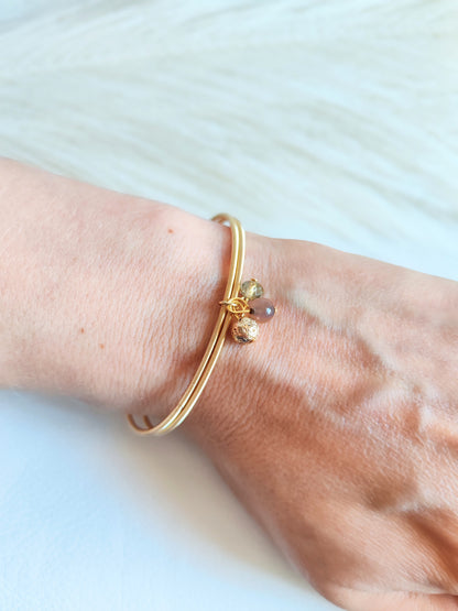 Bracciale elastico in acciaio dorato
