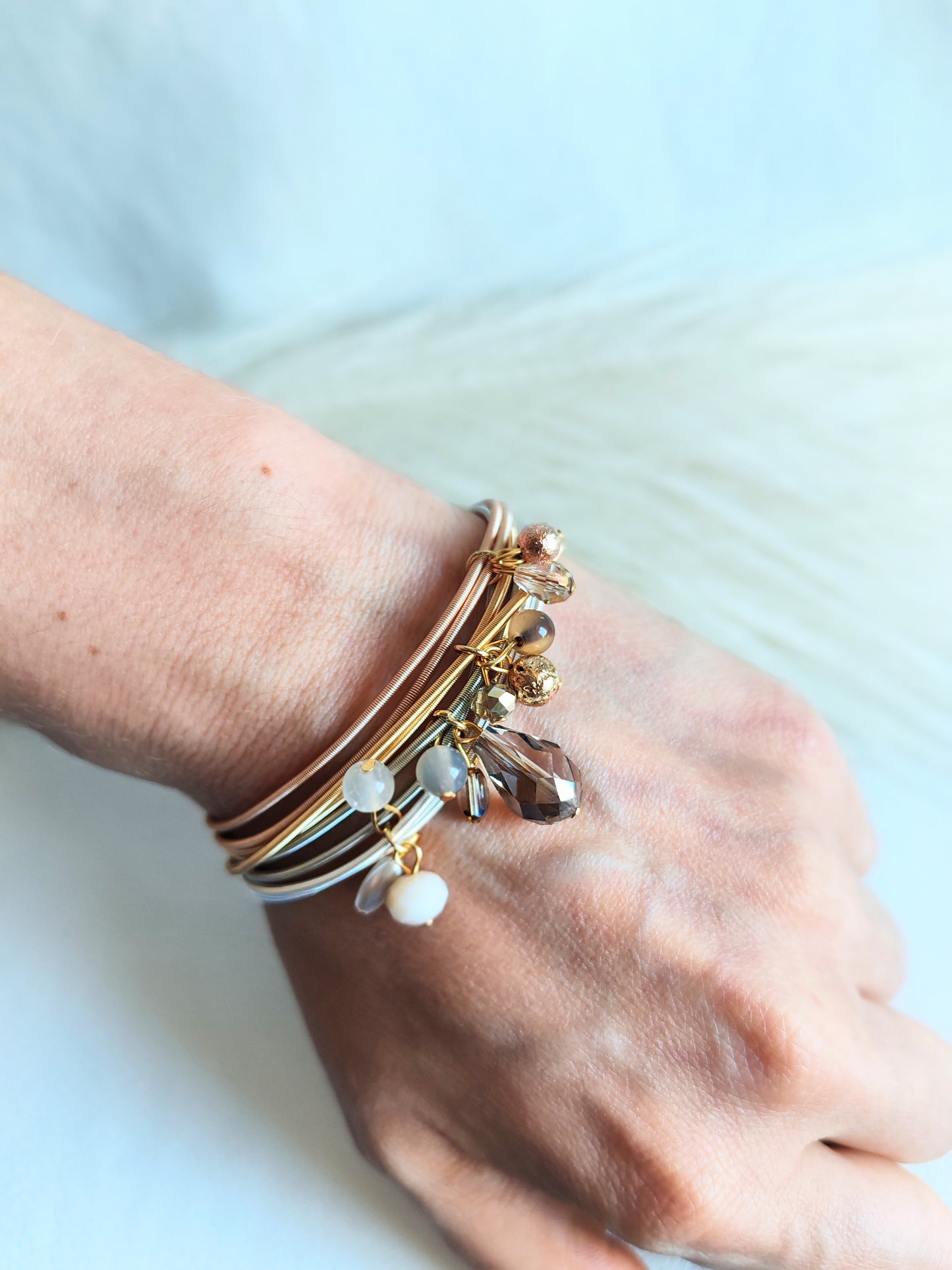 Bracciale elastico in acciaio rosato